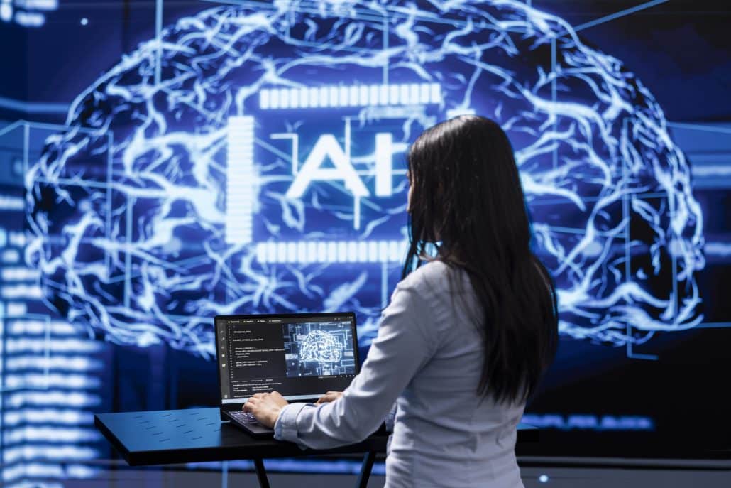 Frau arbeitet an Laptop vor KI-Hintergrund