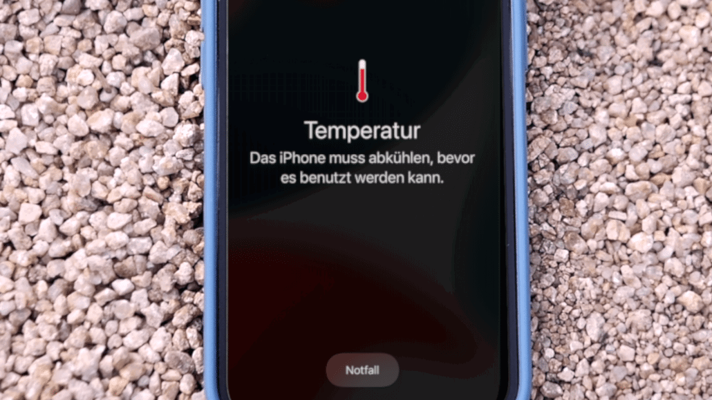 iPhone zeigt Überhitzung und Kühlungsanweisung an.